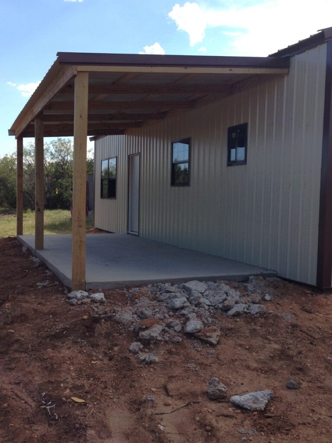 Back porch - Barndominium construction by Texstone Homes